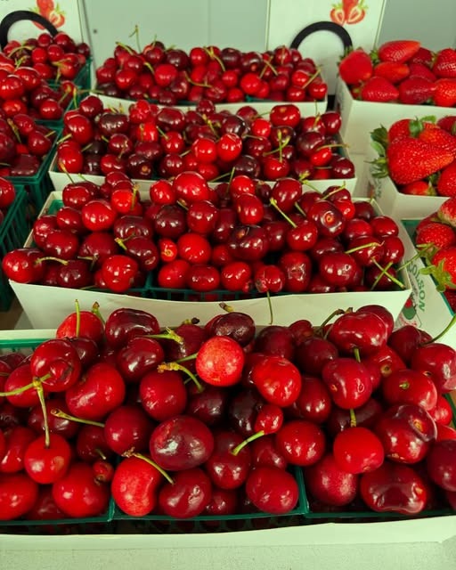 Local seasonal California produce including cherries, watermelon, citrus, Maui onions, and avocados